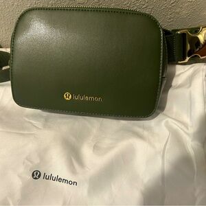 Lululemon Everywhere Belt Bag cactus Leather Barracks Green/Gold color. NWOT.